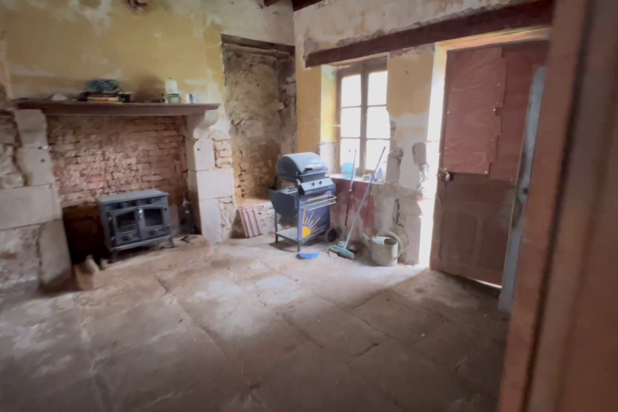 kitchen fireplace and missing wall cupboard